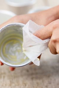 Close-up of hand holding drink