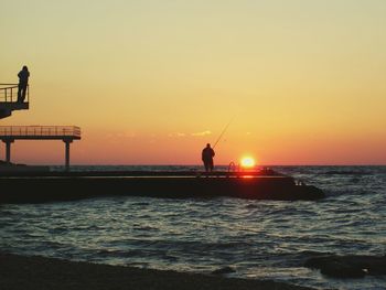 Scenic view of sea at sunset