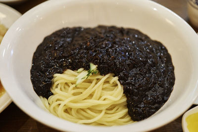 Close-up of noodles in bowl on table