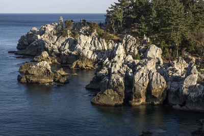 Scenic view of rock formations at chuam beach