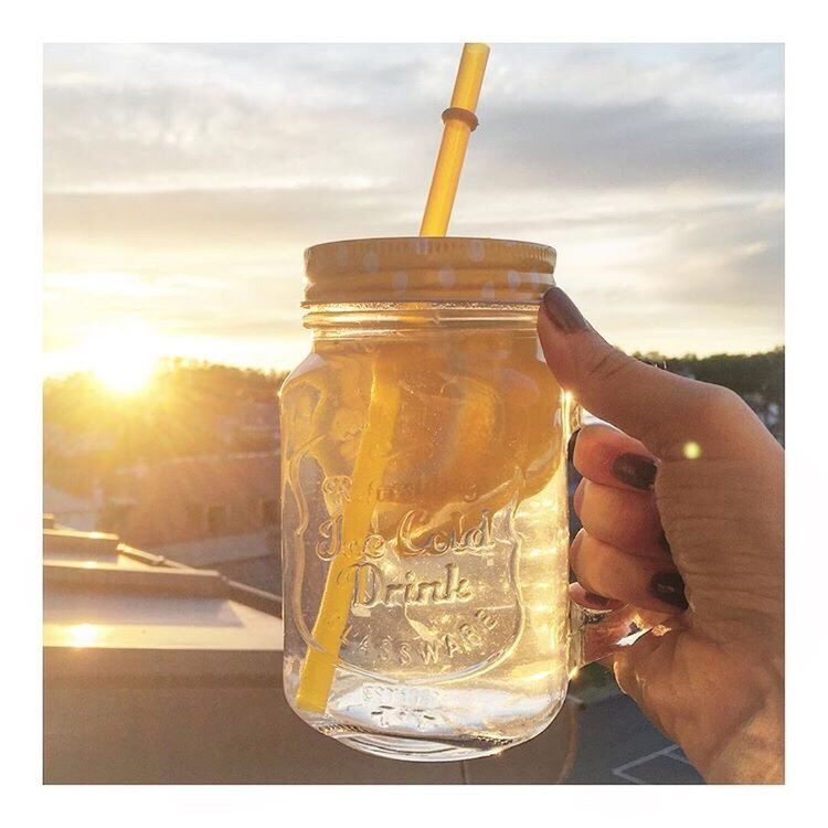 refreshment, freshness, alcohol, part of, sky, close-up, cropped, cloud - sky, unrecognizable person, personal perspective, leisure activity, lifestyles, outdoors, focus on foreground, beer glass, cloud, orange color, indulgence