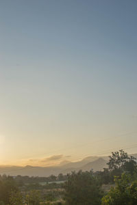 Scenic view of silhouette landscape against clear sky