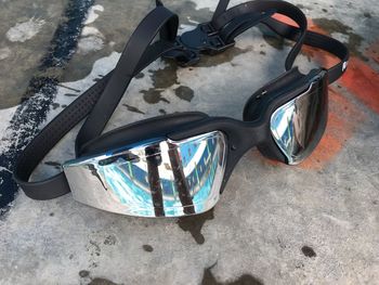 High angle view of sunglasses on mirror