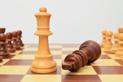 Close-up of chess against white background