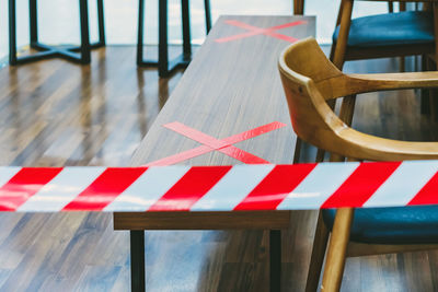 Close-up of empty chair on table