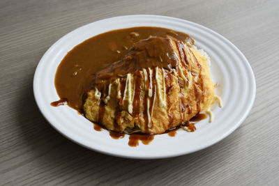 High angle view of fresh meal served in bowl on table