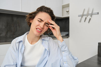 Young woman using mobile phone