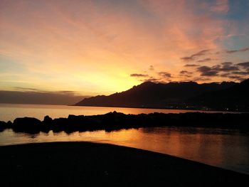 Scenic view of sea against sky during sunset