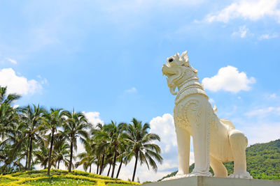 Low angle view of statue against sky