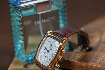 Close-up of clock on table