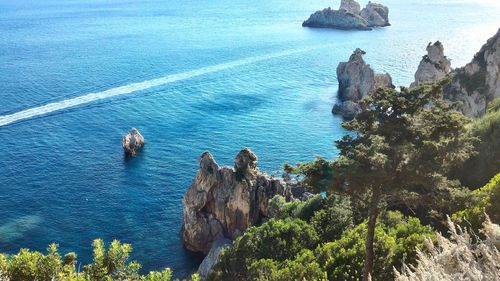 High angle view of rock formation in sea