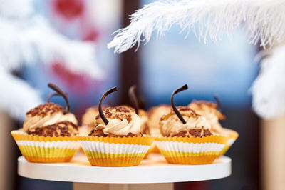 Close-up of cupcakes on table