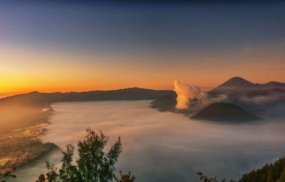 Scenic view of mountains against sky during sunset