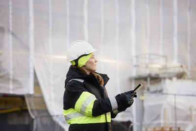 Female engineer at building site