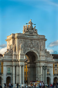 Group of people in front of historical building