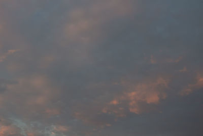 Low angle view of dramatic sky during sunset