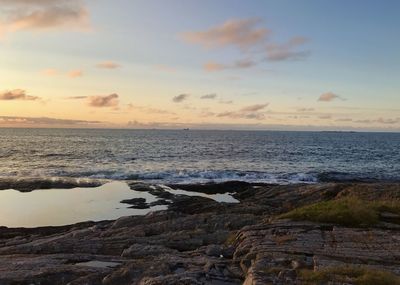 Scenic view of sea against sky during sunset