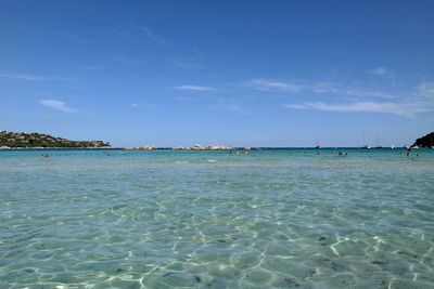 Scenic view of sea against blue sky