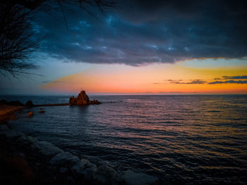 Scenic view of sea against sky during sunset