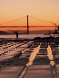 Scenic view of bridge over river against sky