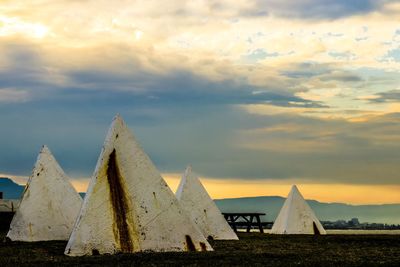 Built structure against sky during sunset