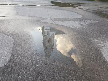 High angle view of puddle on road