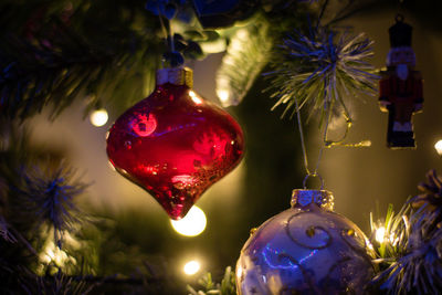 Close-up of illuminated christmas tree at night