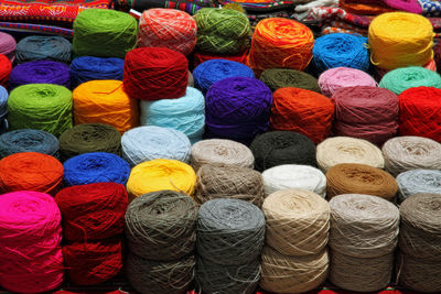 Colorful balls of wools in market stall