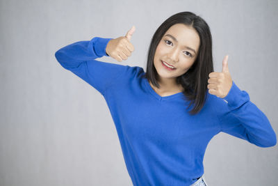 Portrait of a smiling young woman