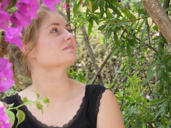 Portrait of young woman looking away