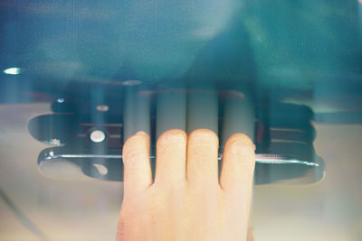 Close-up of hand holding smart phone