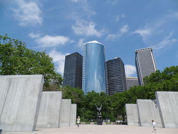 View of buildings against cloudy sky