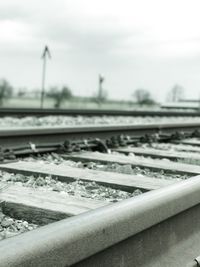 Close-up of railroad track against sky