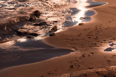 High angle view of sand at beach