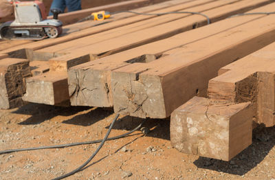 High angle view of stack of wood at construction site