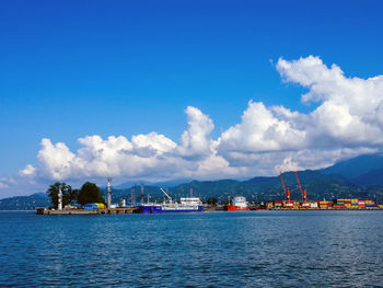 Scenic view of sea against blue sky