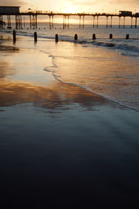 Scenic view of sea against sky at sunset