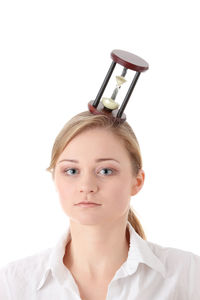 Portrait of a beautiful young woman over white background