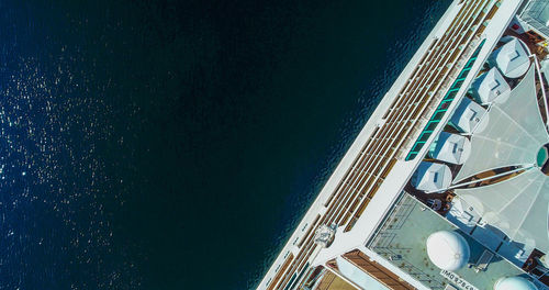 High angle view of road by sea against city