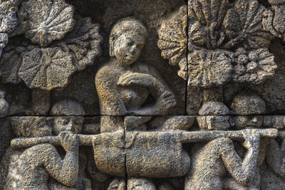 Close-up of sculpture against wall