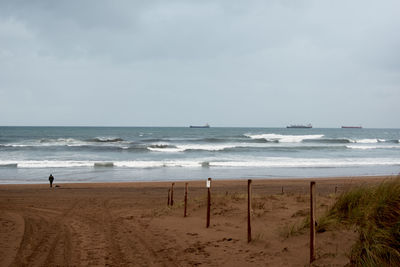 Scenic view of beach against sky