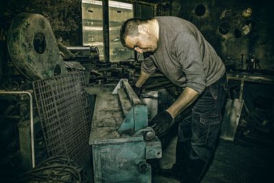 Man working on metal