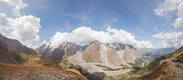 Panoramic view of landscape with mountain range in background