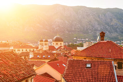 High angle view of townscape against mountain