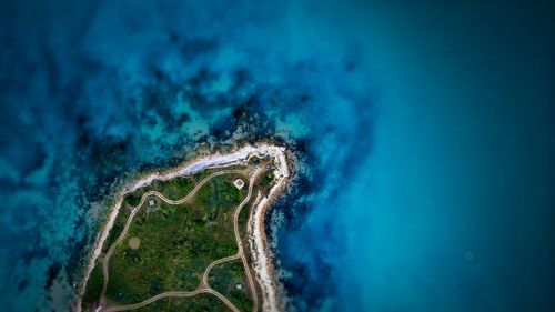 Close-up of rusty blue sea