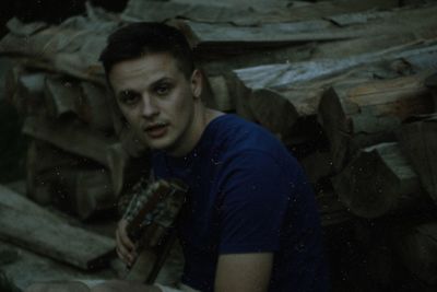 Portrait of young man looking at camera