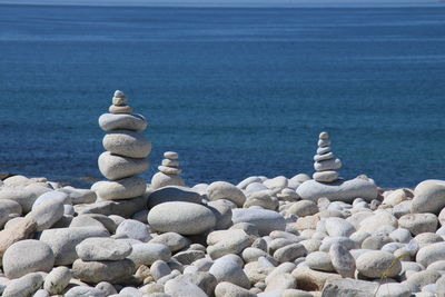 Stack of pebbles at sea shore