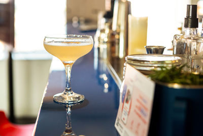 Close-up of wineglass on table