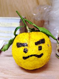 Close up of yellow food on wood