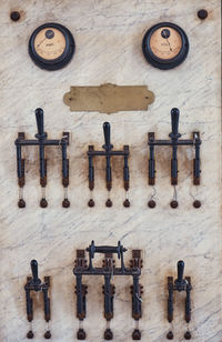 High angle view of objects hanging on wall